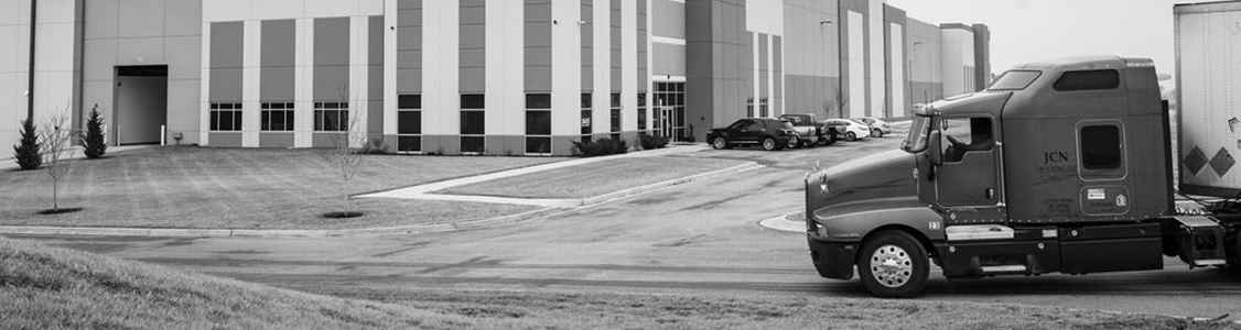 Truck pulling into Beyond Warehousing's inbound docks